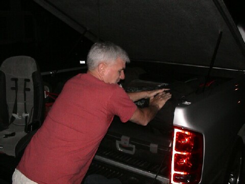 Greg's truck bed is FULL of luggage.